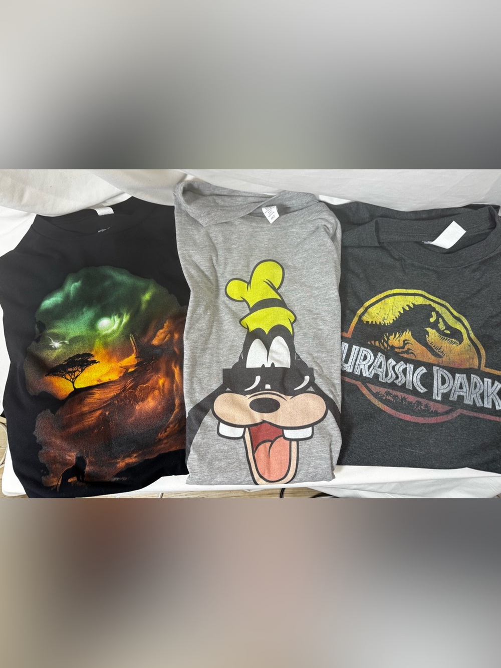 NWOT set of 3 Box Lunch Men’s t-shirt, The Lion King, Goofy Jurassic Park 4XLT